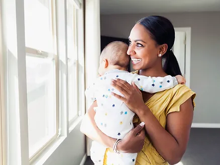 woman holding baby